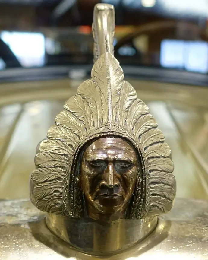Brass Native American head radiator cap detail, 1926 Pontiac Two-Door Coach Native American Head Hood Ornament Detail, Automobile Driving Museum, El Segundo, CA USA Photo credit: Daderot, Wikimedia Commons